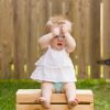 Child holding Kleynimals Rattle 2
