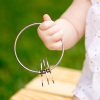 Child holding Kleynimals Rattle - detail 3