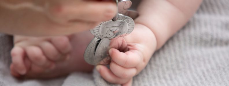 Baby grasping metal toy keys