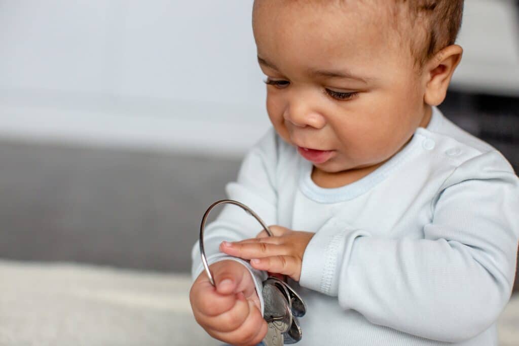 Baby developing senses with Kleynimls toys